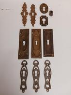 assorti koperen/bronzen metalen sleutel-afdekplaatjes, Ophalen