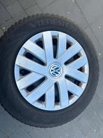 Stalen velgen met winterbanden en originele vw doppen., Auto diversen, Wieldoppen, Ophalen, Gebruikt