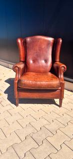 Schapenleren Oorfauteuil, Ophalen
