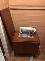 Naaimachine met kast., Ophalen
