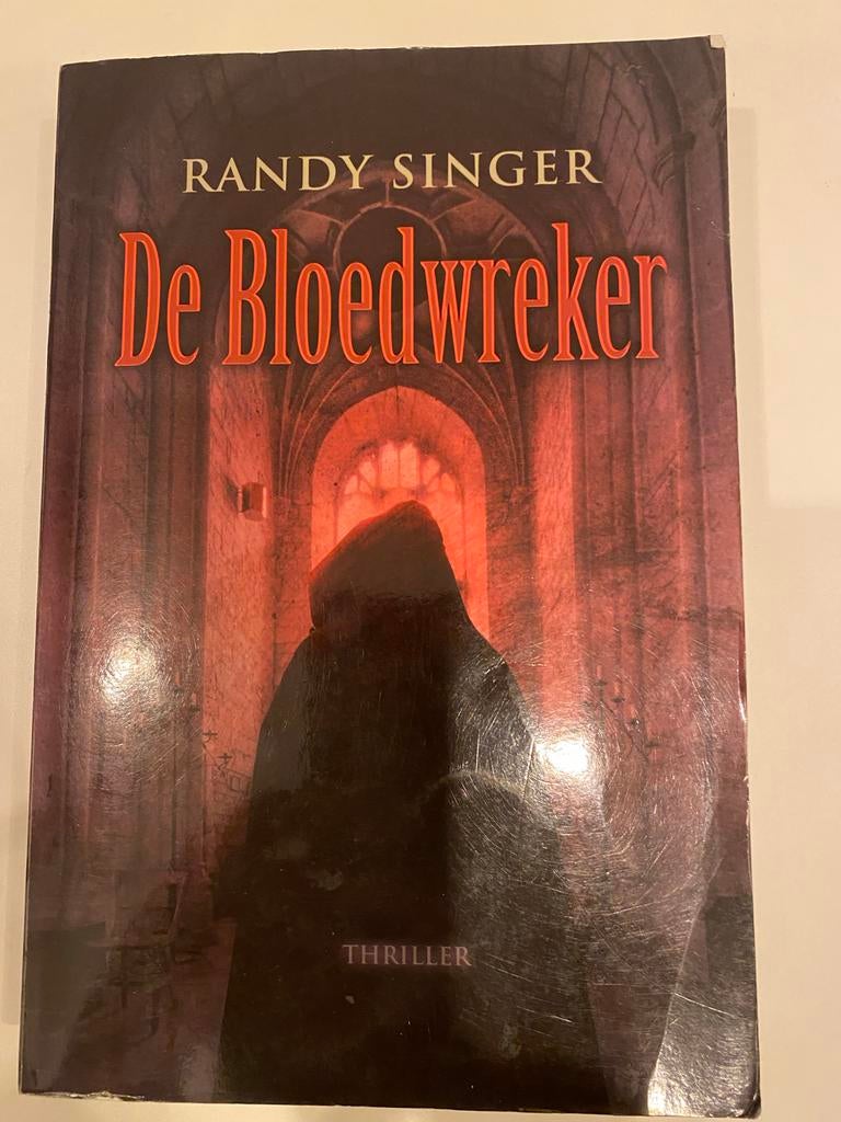 De Bloedwreker - Randy Singer - Thriller, Ophalen of Verzenden, Gelezen, Nederland