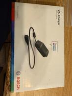 Bosch 2A Lader - Nieuw!, Fietsen en Brommers, Fietsaccessoires | Fietsaccu's, Ophalen of Verzenden, Nieuw