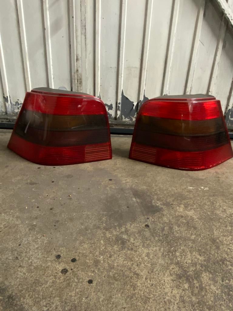 Golf 4 achterlichten (hella smoke), Auto-onderdelen, Verlichting, Ophalen of Verzenden