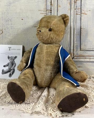 Grote jaren 50 stro gevulde beer met houten schijven beschikbaar voor biedingen