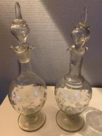 2 karaffen met stoppen, Ophalen