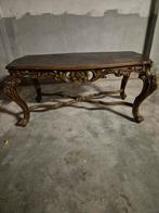 Antieke salontafel met sierlijke details, Ophalen
