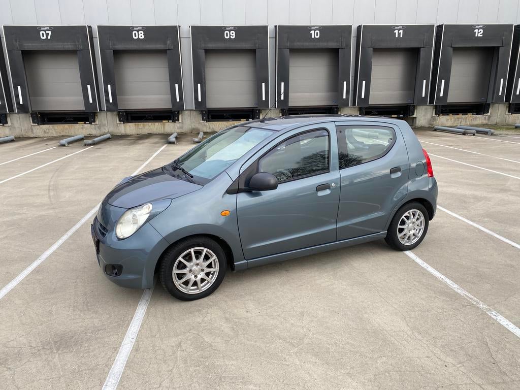 Suzuki Alto 1.0 2011 Grijs, Auto's, Stof, Euro 6, 4 stoelen, Origineel Nederlands