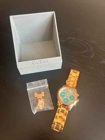 GUESS horloge rose met blauwe wijzerplaat beschikbaar voor biedingen