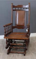 Antieke schommelstoel met leerbekleding, Ophalen
