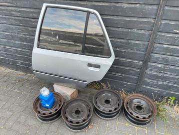 Peugeot 205 deur links achter, velgen en wiellagers beschikbaar voor biedingen