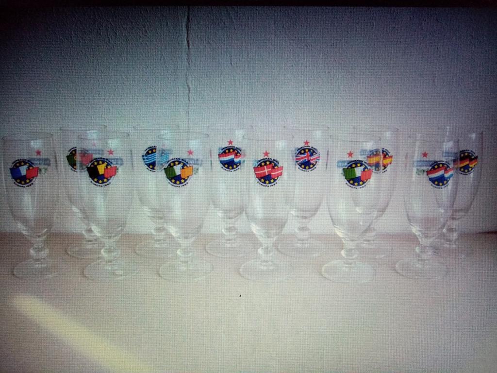 12 Heineken Europa voetglazen, Ophalen of Verzenden, Nieuw, Glas of Glazen, Heineken