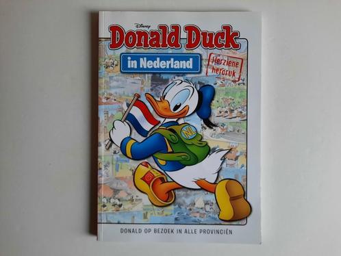Donald Duck in Nederland - Herziene versie, Boeken, Stripboeken, Gelezen, Eén stripboek, Ophalen of Verzenden