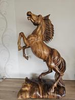 Prachtig houten paard!, Ophalen