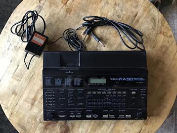 Roland RA50 realtime arranger beschikbaar voor biedingen