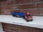 Tekno  Mack  F700  met  vlakke  trailer  van  Lindenberg., Hobby en Vrije tijd, Modelauto's | 1:50, Ophalen of Verzenden, Nieuw