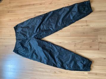 Regenbroek XXL met ritsen beschikbaar voor biedingen