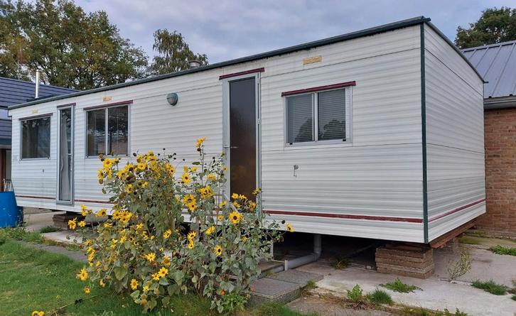 Zonnige stacaravan - woonunit Muller Batavier, Caravans en Kamperen, Stacaravans, Ophalen