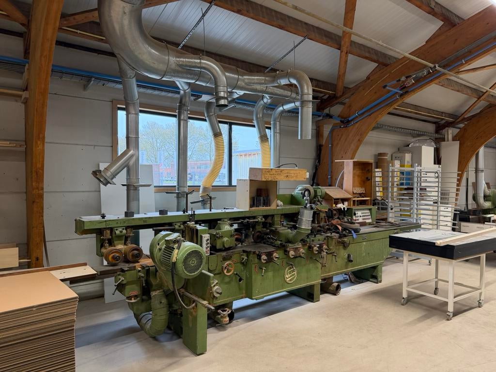 Weinig 4-zijdige schaafmachine, Ophalen