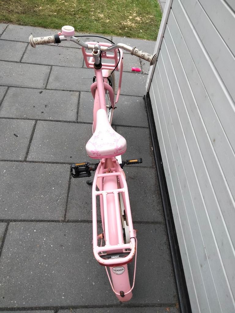 Roze kinderfiets, Ophalen