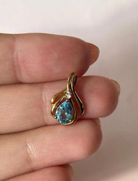 9 karaat gouden hanger met topaas en diamant, Verzenden, Zo goed als nieuw, Goud