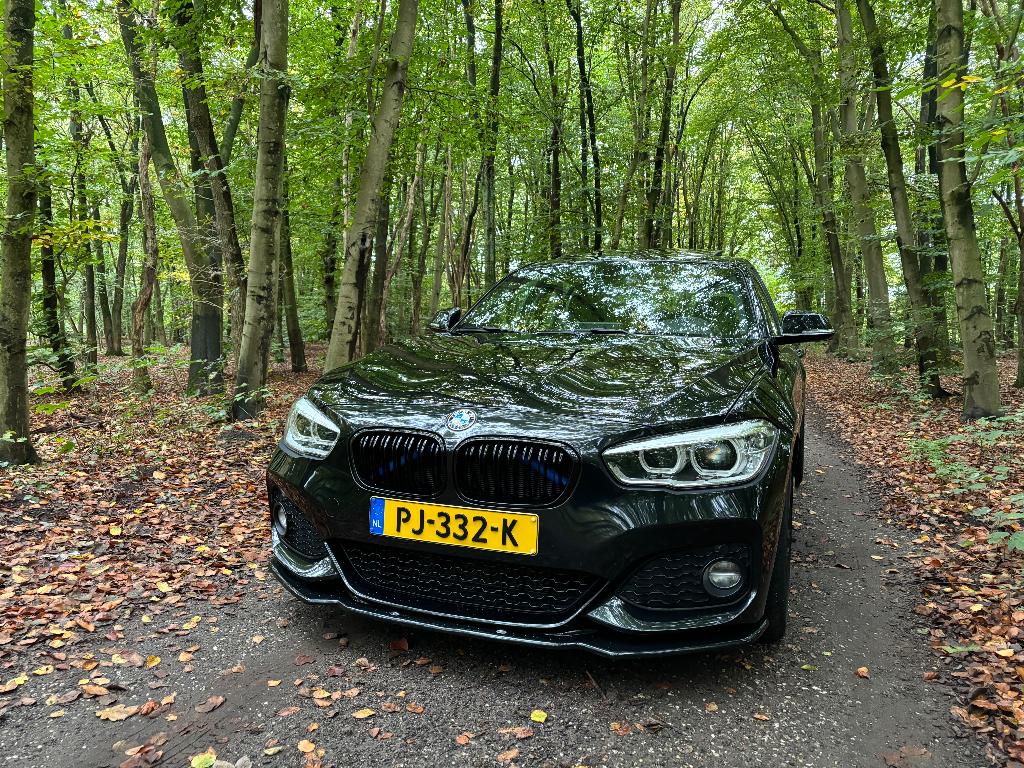 BMW 1-Serie 120i 184pk Aut 2017 Zwart, Auto's, 1998 cc, Achterwielaandrijving, Zwart, 4 cilinders