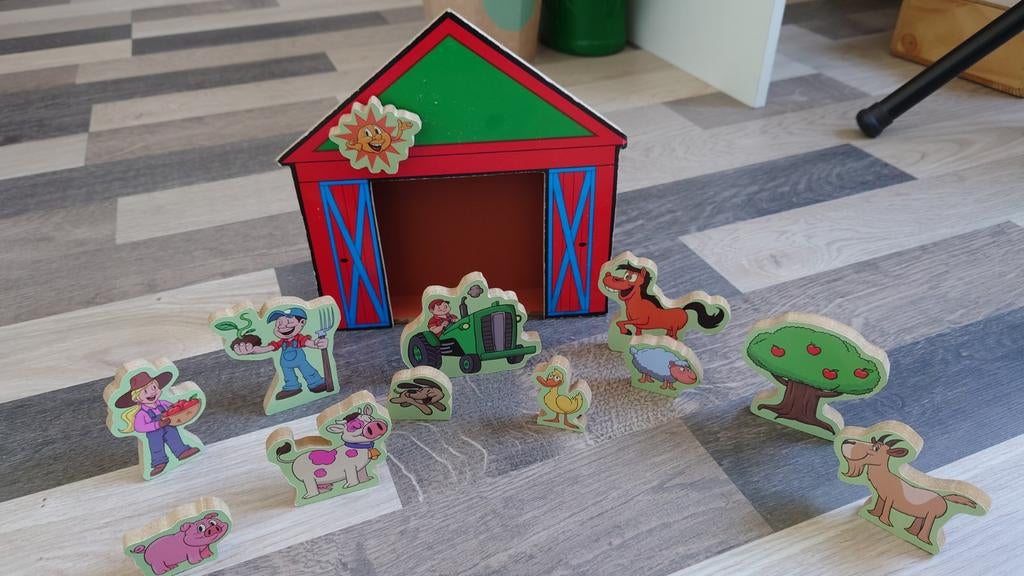 Houten boerderij met figuren, Ophalen