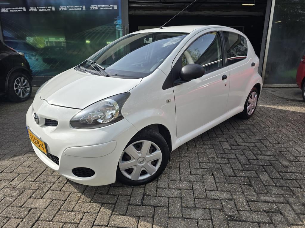 Toyota Aygo 1.0-12V Access | 1E EIGENAAR | 12MND GARANTIE |, Auto's, Toyota, Voorwielaandrijving, Stof, Gebruikt, 4 stoelen