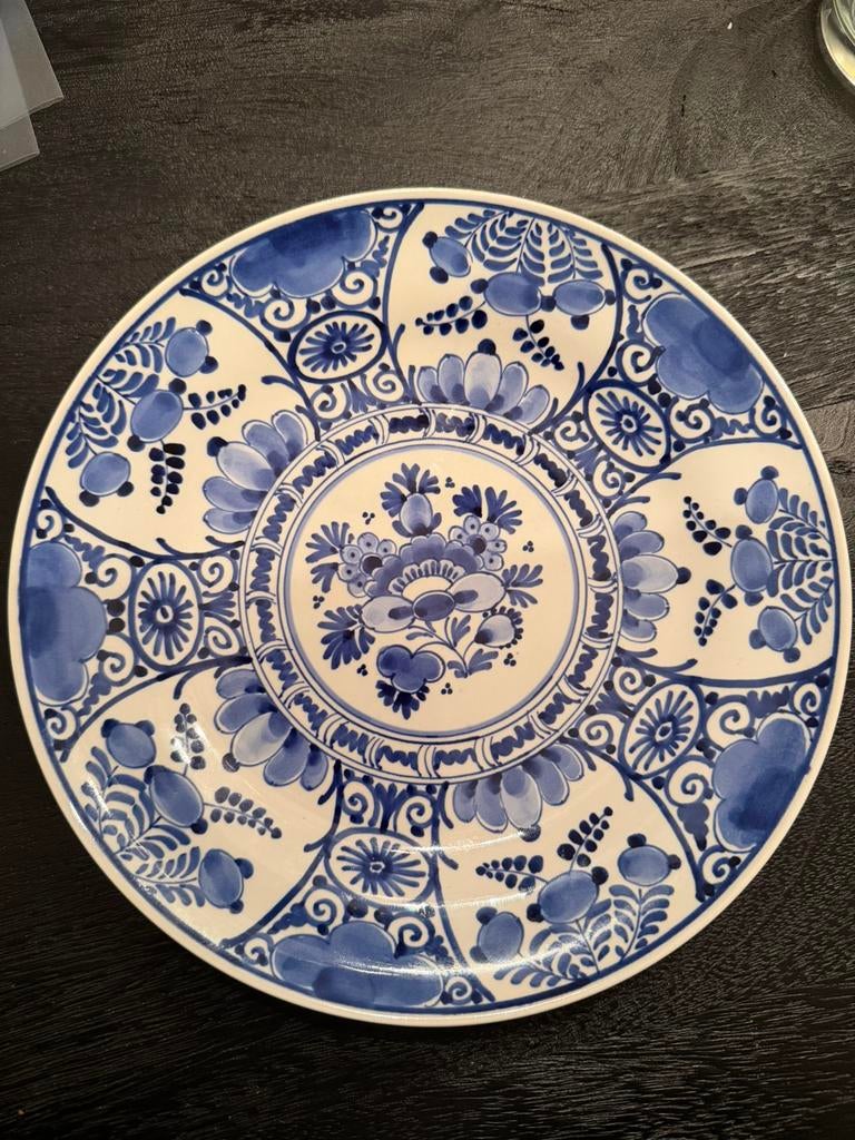 Delfts Blauw bordje, Ophalen