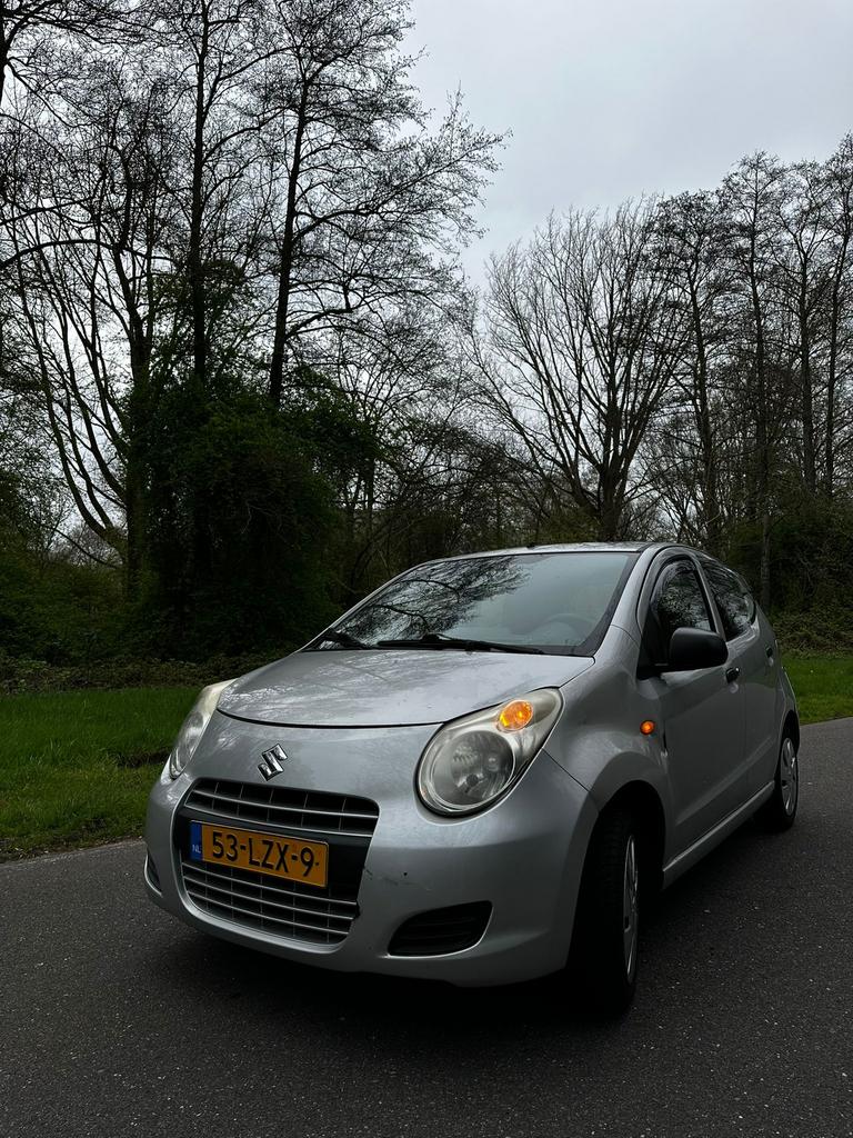 Suzuki Alto 1.0 2010 Grijs, Auto's, Voorwielaandrijving, 200 kg, 4 stoelen, Origineel Nederlands