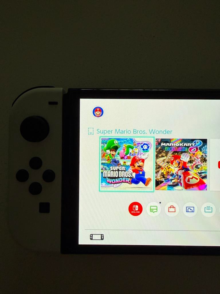 Nintendo Switch OLED met zes spellen, Met games, Met 2 controllers, Zo goed als nieuw, Switch OLED