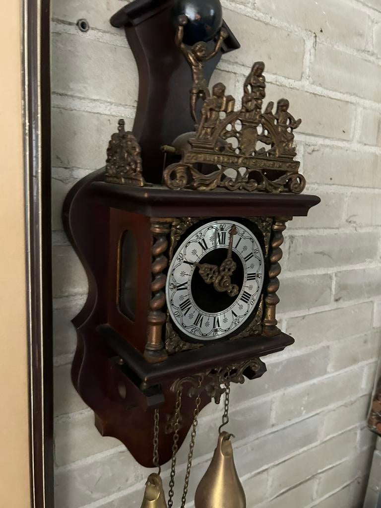 Zaanse klok, Ophalen