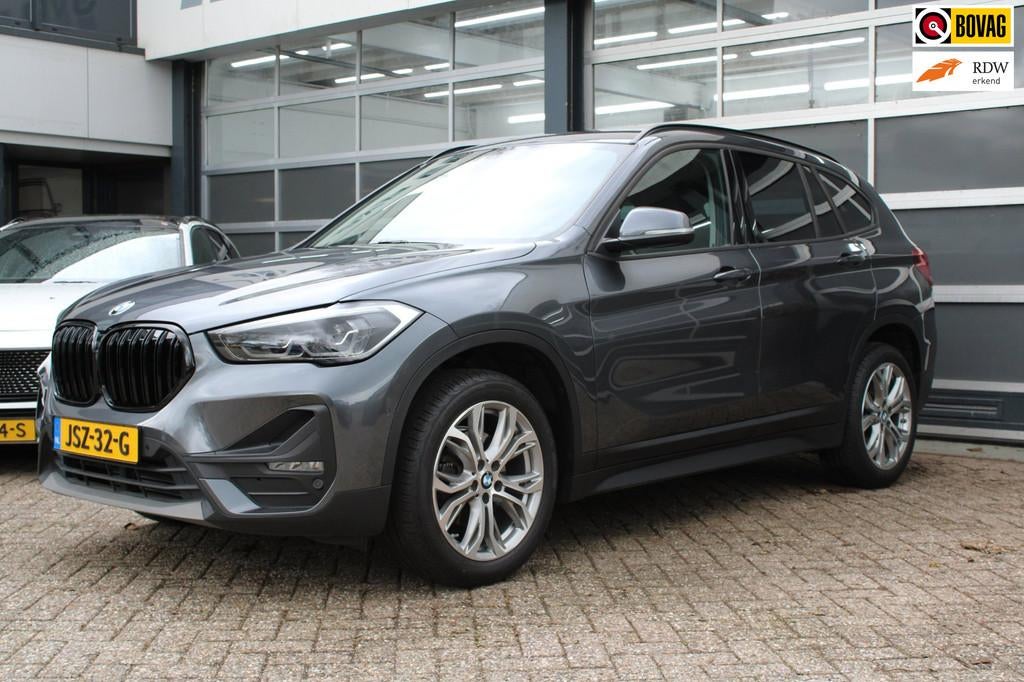 BMW X1 SDrive18i/Leer/Automaat, Auto's, BMW, Gebruikt, Zwart, USB, Leder