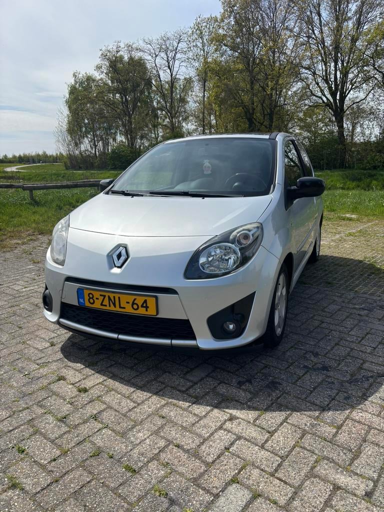 Renault Twingo 1.2 55KW E3 2011 Grijs, Auto's, Renault, Voorwielaandrijving, 4 cilinders, 4 stoelen, Airbags