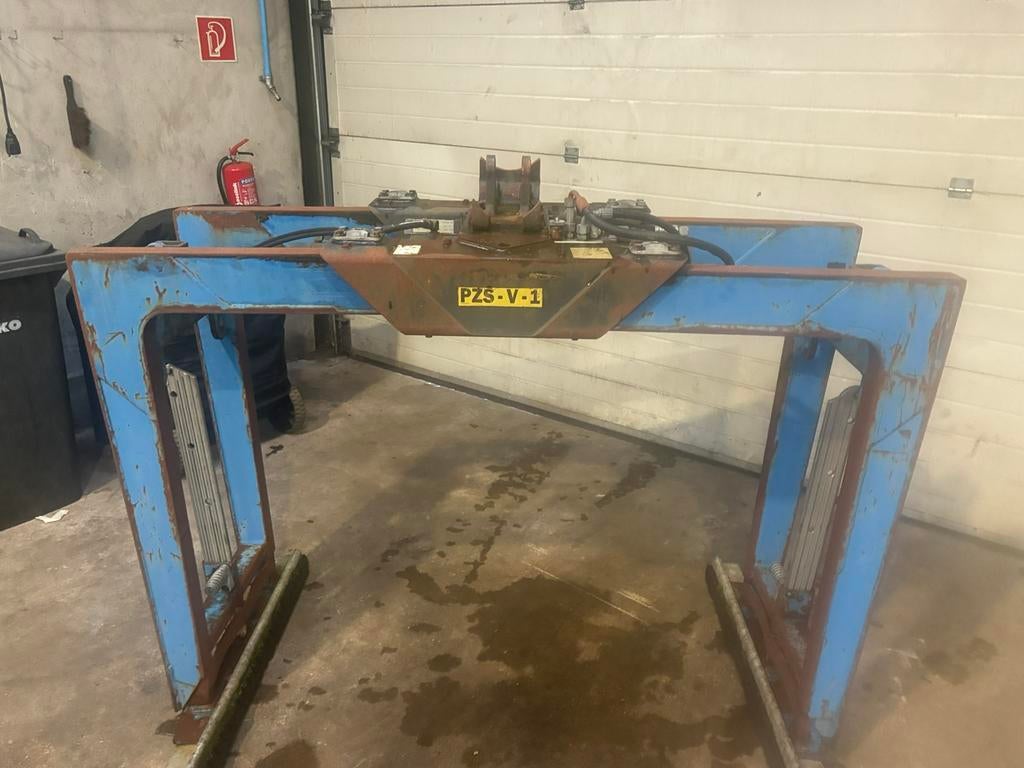 Palfinger stenenklem, Ophalen