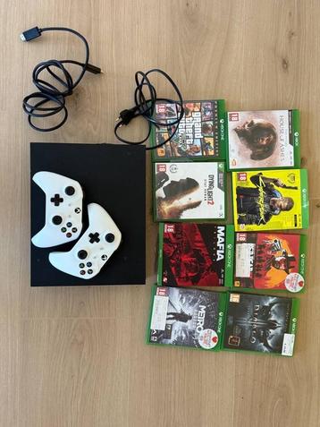 Xbox One X + 2 controllers + 8 topgames beschikbaar voor biedingen