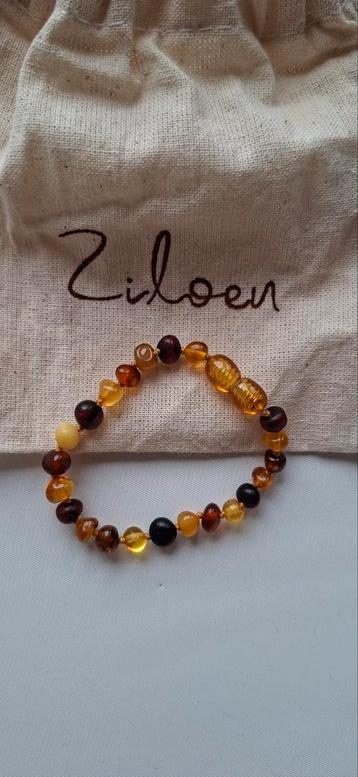 Ziloen Barnsteen Baby Armbandje - Zo Goed Als Nieuw beschikbaar voor biedingen