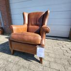Fauteuil in schapenleer cognac kleur. Lichtbruin., Huis en Inrichting, Fauteuils, Ophalen, Gebruikt, Minder dan 75 cm, 50 tot 75 cm