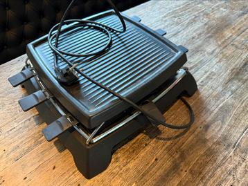 Heet plaat en fondue koker gebruikt beschikbaar voor biedingen