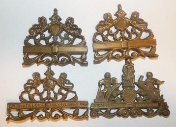 4x ornament van een klok [1904] beschikbaar voor biedingen