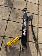 Achterbrug met veer Derbi senda xtreme 12 mm as, Ophalen of Verzenden