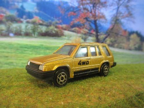1:55 Toyota Tercel 4WD 1- Majorette No.273 metallic gold, Hobby en Vrije tijd, Modelauto's | Overige schalen, Gebruikt, Ophalen of Verzenden