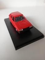 Mazda 323HB 1500 kleur rood nieuw in de box zeer uniek, Hobby en Vrije tijd, Modelauto's | 1:43, Ophalen of Verzenden, Nieuw, Auto