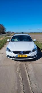 Volvo V60 D5 Twin Engine 231pk Geartronic AWD Plug In Hybrid, Auto's, Volvo, 1800 kg, Beige, Leder en Stof, Particulier