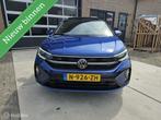 Volkswagen Taigo 1.0 TSI R-Line DSG PANO LMV STOELVERWARMING, Auto's, Stof, Gebruikt, Euro 6, Blauw