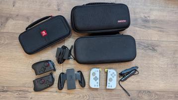 Nintendo Switch OLED Wit + toebehoren (cases, controllers) beschikbaar voor biedingen