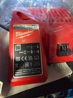 Nieuwe Milwaukee M12-18C Oplader, Doe-het-zelf en Verbouw, Gereedschap | Machine-onderdelen en Toebehoren, Ophalen of Verzenden