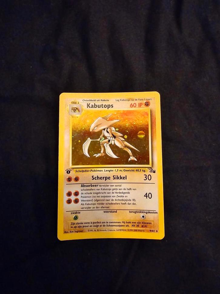Kabutops 9/62 Fossil 1st Editie nederlands, Hobby en Vrije tijd, Verzamelkaartspellen | Pokémon, Zo goed als nieuw, Losse kaart