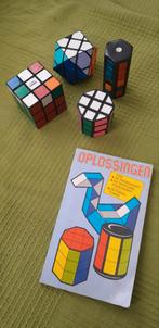 4 Rubika puzzels met boekje, Minder dan 500 stukjes, Gebruikt, Ophalen of Verzenden
