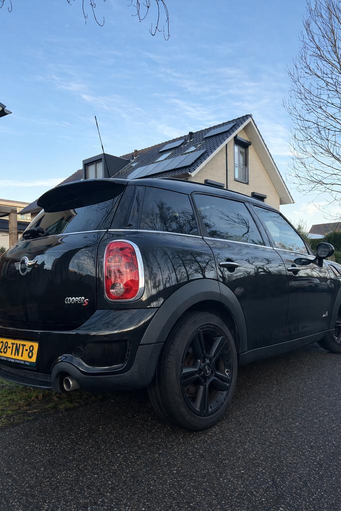 Mini Countryman 1.6 Cooper S All4 AUT 2011 Zwart, Auto's, Mini, Particulier, Countryman, 4x4, Airbags, Airconditioning, Bluetooth