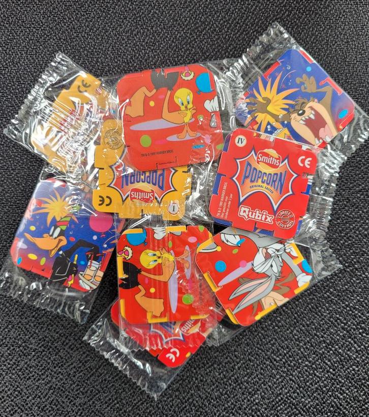 9st Popcorn Qubix in verpakking., Verzamelen, Flippo's, Overige typen, Adventure, Cheetos 24 Game, Chester Cheetos, Flying, Gouden Flippo's